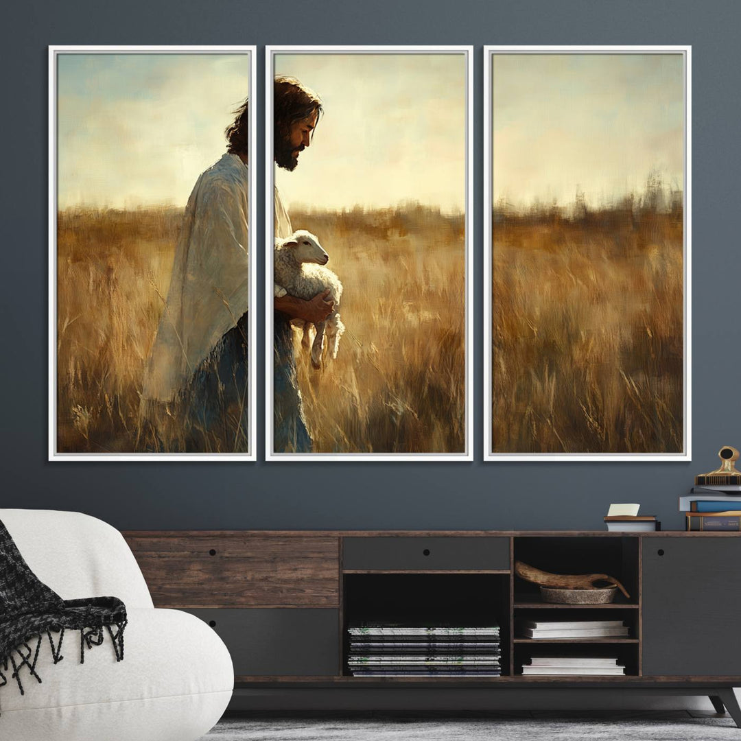 The Jesus the Good Shepherd wall art print depicts Jesus gently holding a lamb under a clear sky.