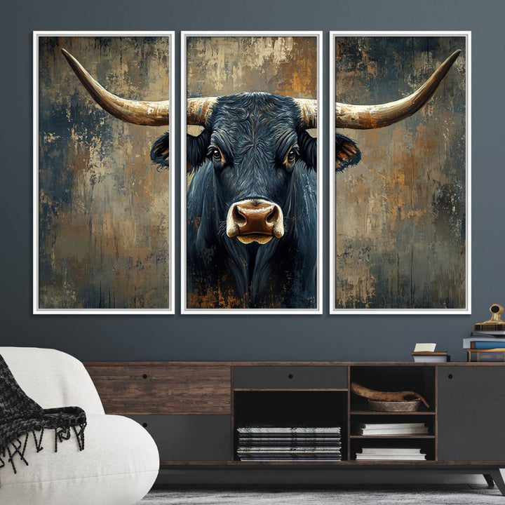 The Texas Western Wall Art Canvas Print showcases a Longhorn Bull set against an abstract brown and gray backdrop, making it perfect for rustic decor.