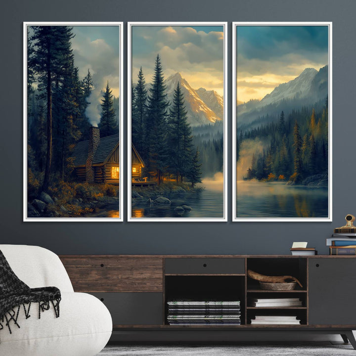 Serene sunset lake wall art: a cozy mountain cabin with lights, framed by pine trees and set against a moody sky. Ideal for adding rustic lodge charm to your space.