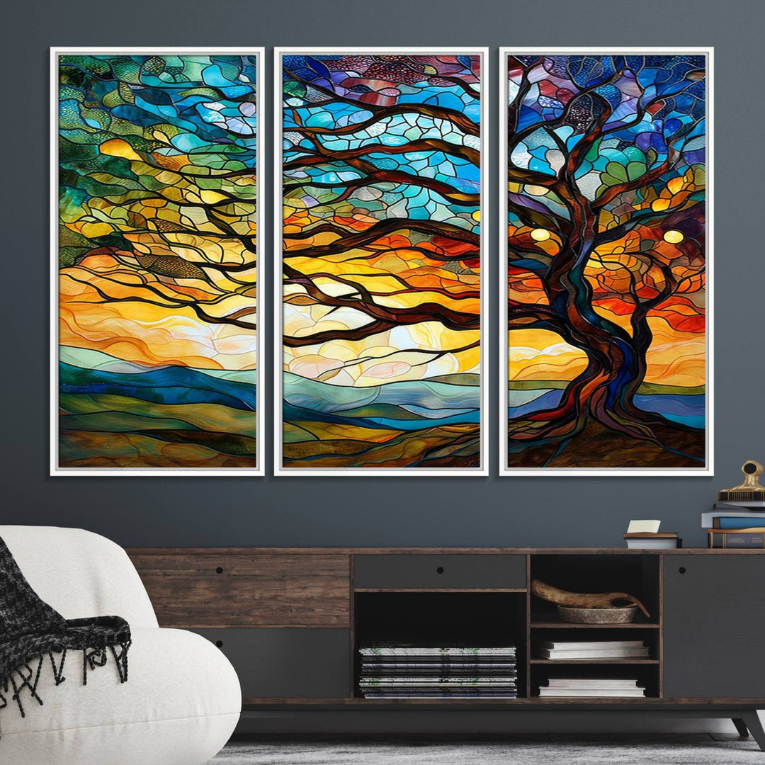 A vivid Tree of Life in stained glass style is depicted with twisted branches, a colorful sky, and hills on a ready-to-hang canvas.