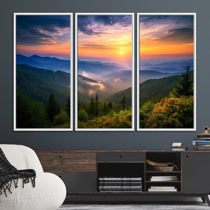 The Majestic Mountain Sunrise Print features a vibrant sky, layered hills, and evergreens, making it a stunning piece of wall decor.