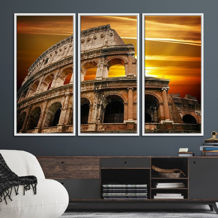 On the wall, theres a piece of art titled Colosseum with Yellow Sunset Behind, Italy.