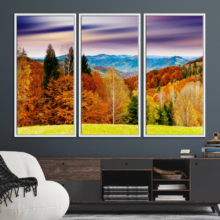 The wall art in the kitchen dining area is a large Autumn Forest Mountain Canvas Print that captures a vivid scenic landscape.