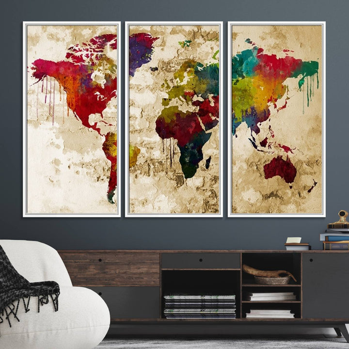 The Rainbow Colored Vintage World Map Canvas Print decorates the room.