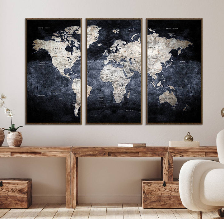 Rustic Black and Bronze World Map Canvas Triptych features white continents on a grunge-stained background.