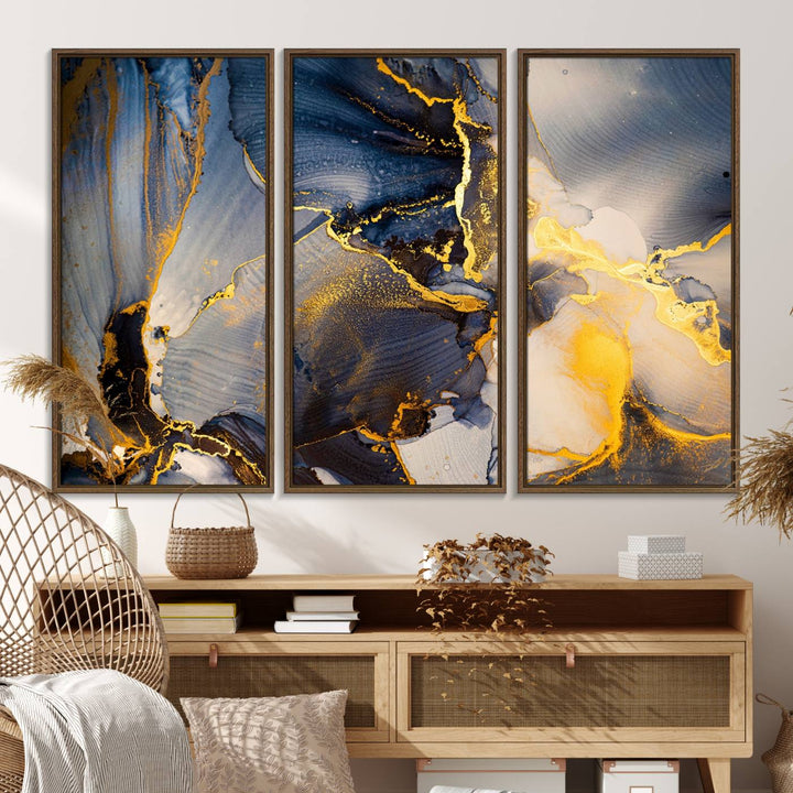 A modern luxury kitchen features a large gold and blue abstract canvas wall art print.