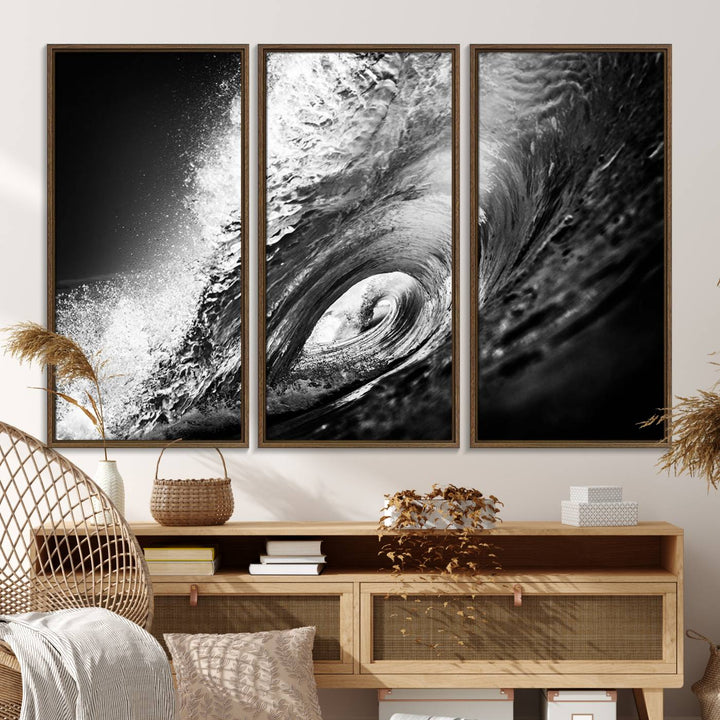 The Black Ocean Wave at Sunset Canvas Art hangs on a grey wooden wall.