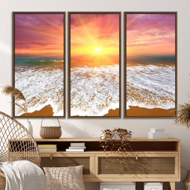 Golden Beach Sunrise 3-panel canvas art of ocean waves, hung on a wooden wall.