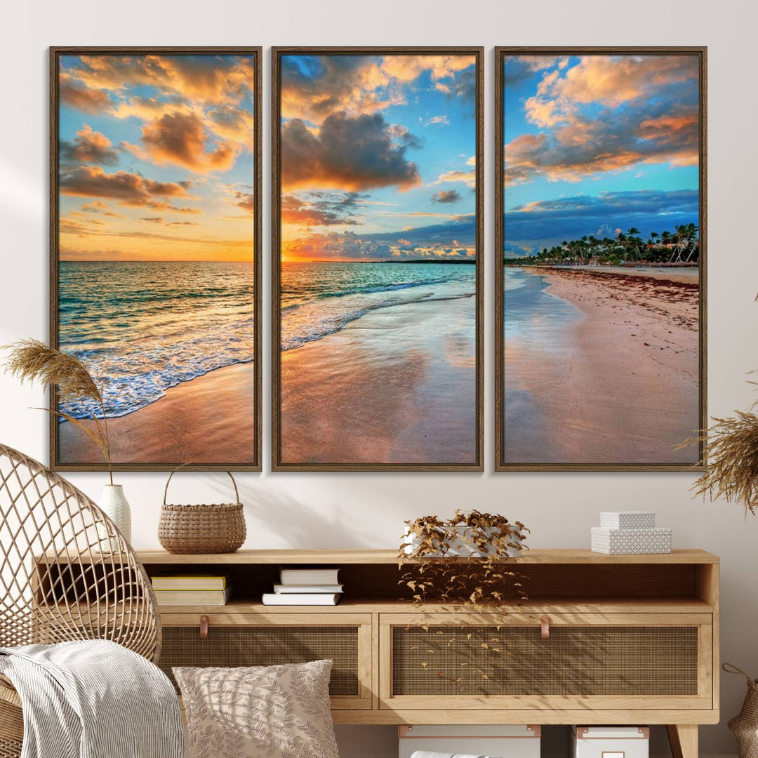 A wall displays Sunset Ocean Waves on Tropical Beach 3-panel canvas art.