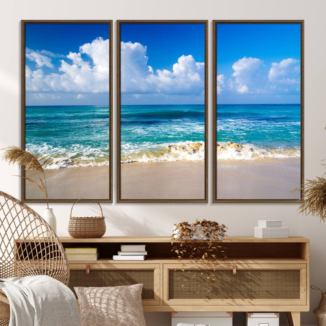 The Tropical Beach 3-Panel Canvas Wall Art features ocean waves gently lapping on a beach under blue skies, making it an ideal choice for coastal decor.