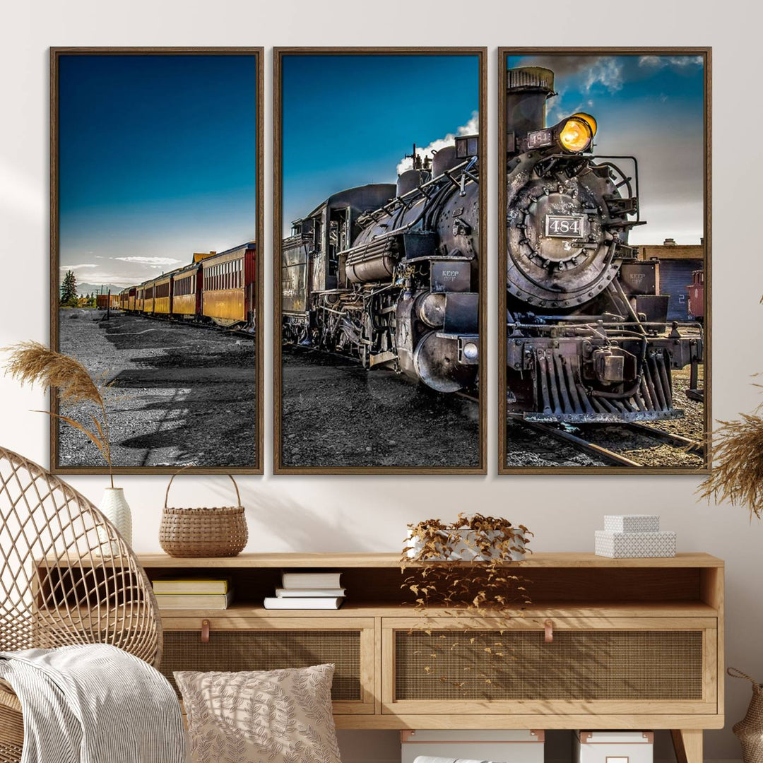 The Train Wall Art Canvas Print features a vintage steam train with a bright headlight.