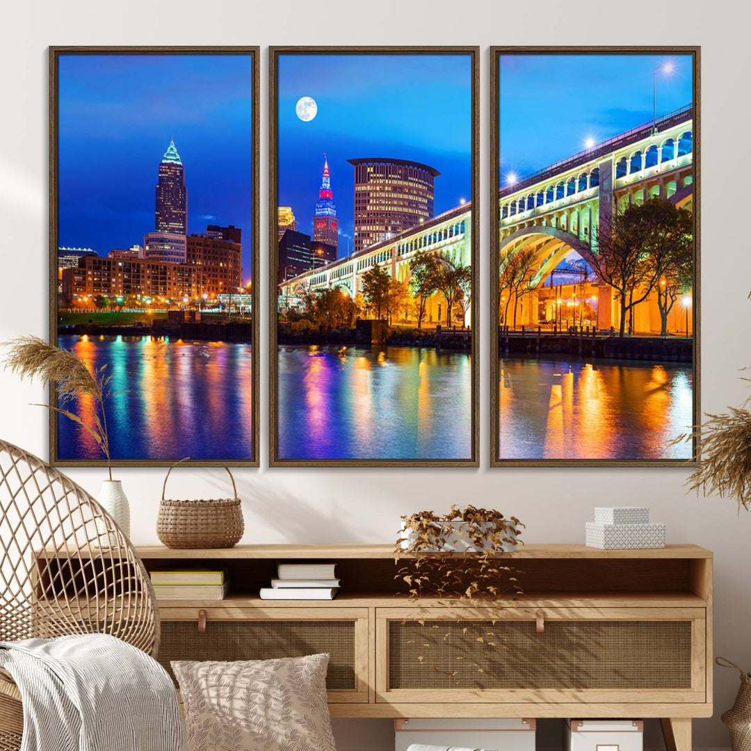 A Cleveland Night Skyline Wall Art on museum-quality canvas showcases a bridge and illuminated buildings.