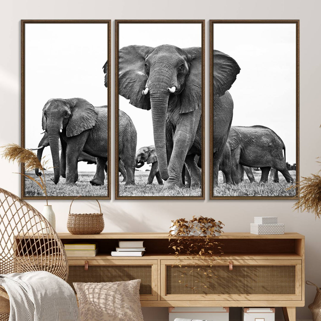 A modern dining area features a Black White Elephant Family Wall Art Canvas Print.