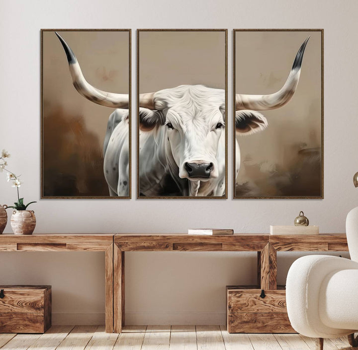 The kitchen features a striking canvas print of a Longhorn Bull.