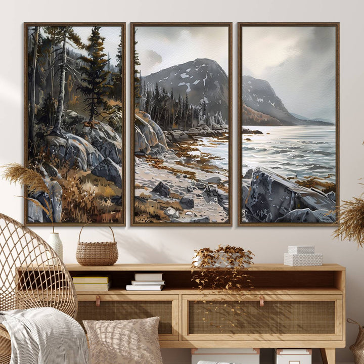 Framed wall art depicting Acadia National Parks rocky coast, trees, mountains, and sunlight over the sea; ready to hang.