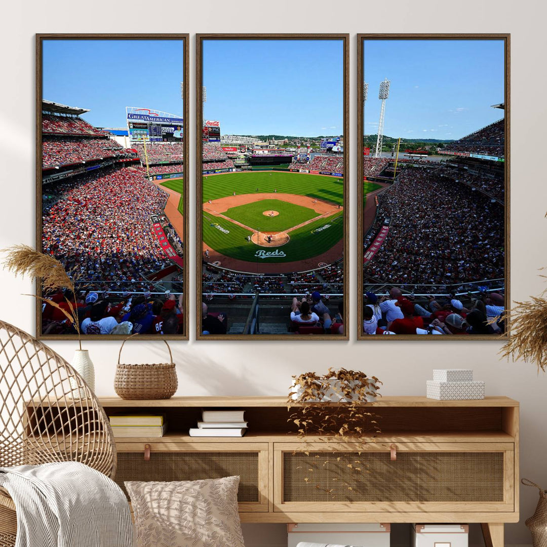 The Cincinnati Reds Baseball Team print of Great American Ball Park Stadium adorns the wall.