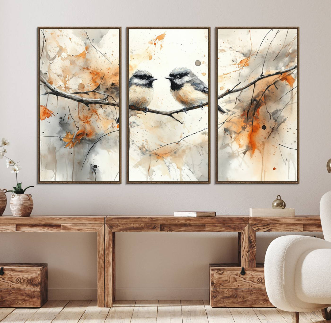 The living room features abstract watercolor chickadee bird art on the wall.
