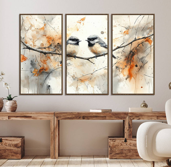 The living room features abstract watercolor chickadee bird art on the wall.