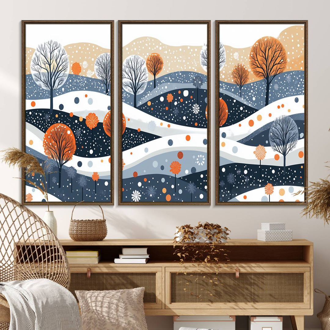 The "Abstract Winter Landscape Canvas Wall Art Print," featuring a triptych of landscapes with trees and hills in vibrant orange, white, and blue hues, adds a gallery-quality finish that transforms the space into an art lover's dream.