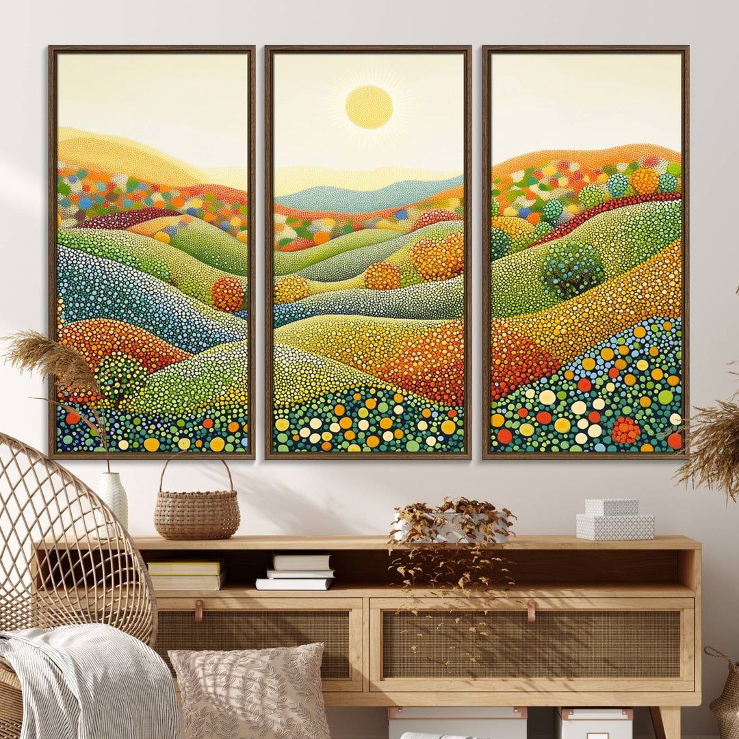 The YAYOI KUSAMA Colorful Dot Art Landscape Canvas, a framed abstract pointillism piece inspired by nature featuring vibrant rolling hills and a sun, adds gallery-quality elegance to your living space.