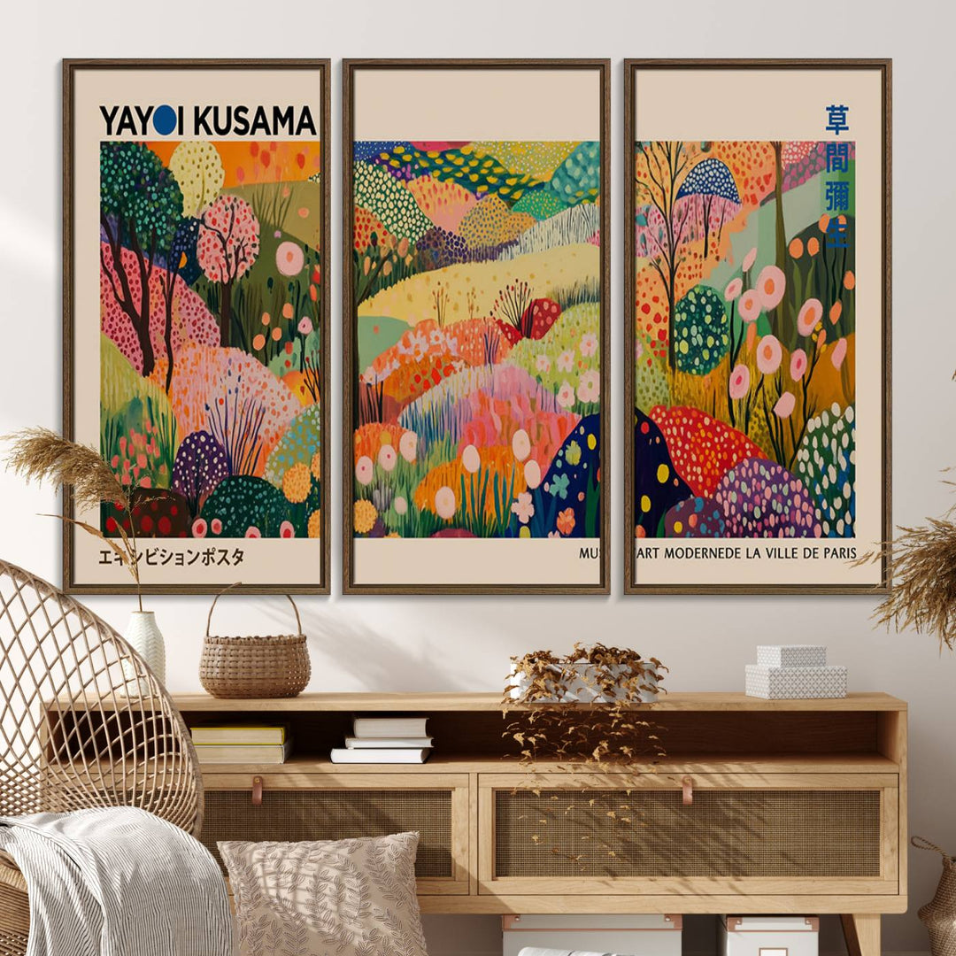 A framed Yayoi Kusama Wall Art Canvas Print features a vibrant abstract landscape adorned with flowers.