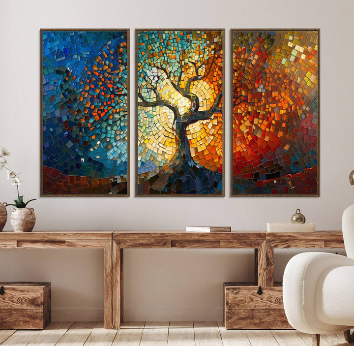 Mosaic Tree Canvas Wall Art: A stunning stained glass-inspired Tree of Life featuring blue and orange swirling patterns reminiscent of a sunburst.