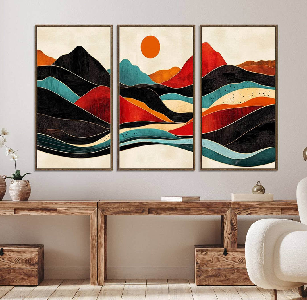 The Colorful Western Triptych Canvas features a vibrant mountain and sun design, making it perfect for modern kitchens or log cabin walls.