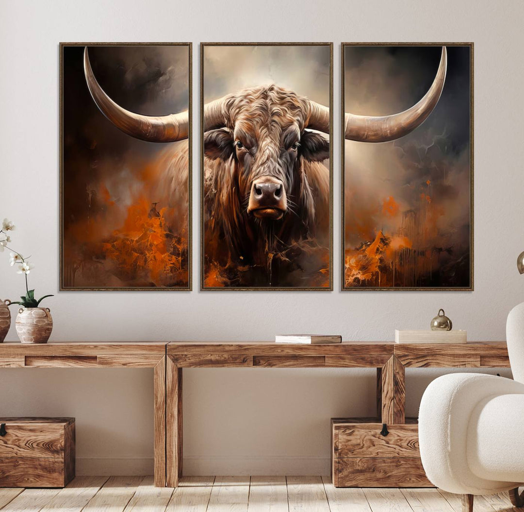 A Highland Bull with striking horns is depicted in a fiery abstract style on a ready-to-hang wall art canvas, evoking strength.