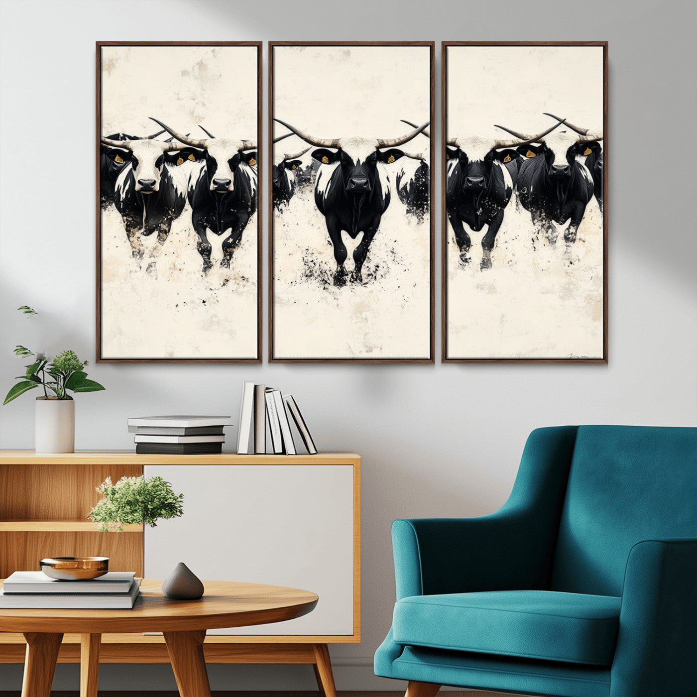 Canvas artwork of black and white Texas longhorns in a bold stampede over a minimalist background, ideal for rustic modern or Western-themed decor.