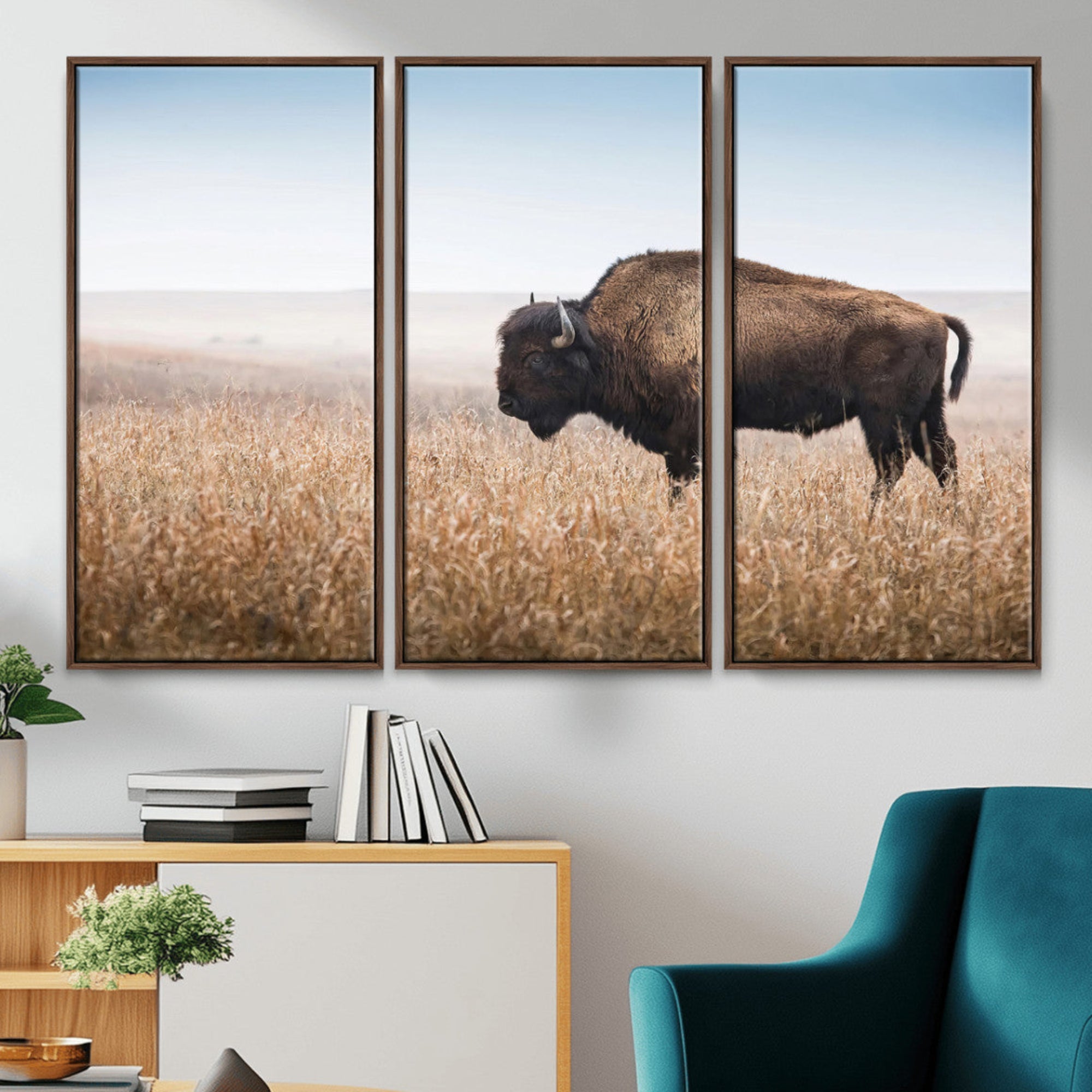 A solitary American bison stands in a dry grassland under soft skies, ideal for rustic or western-style home decor in warm neutral tones.