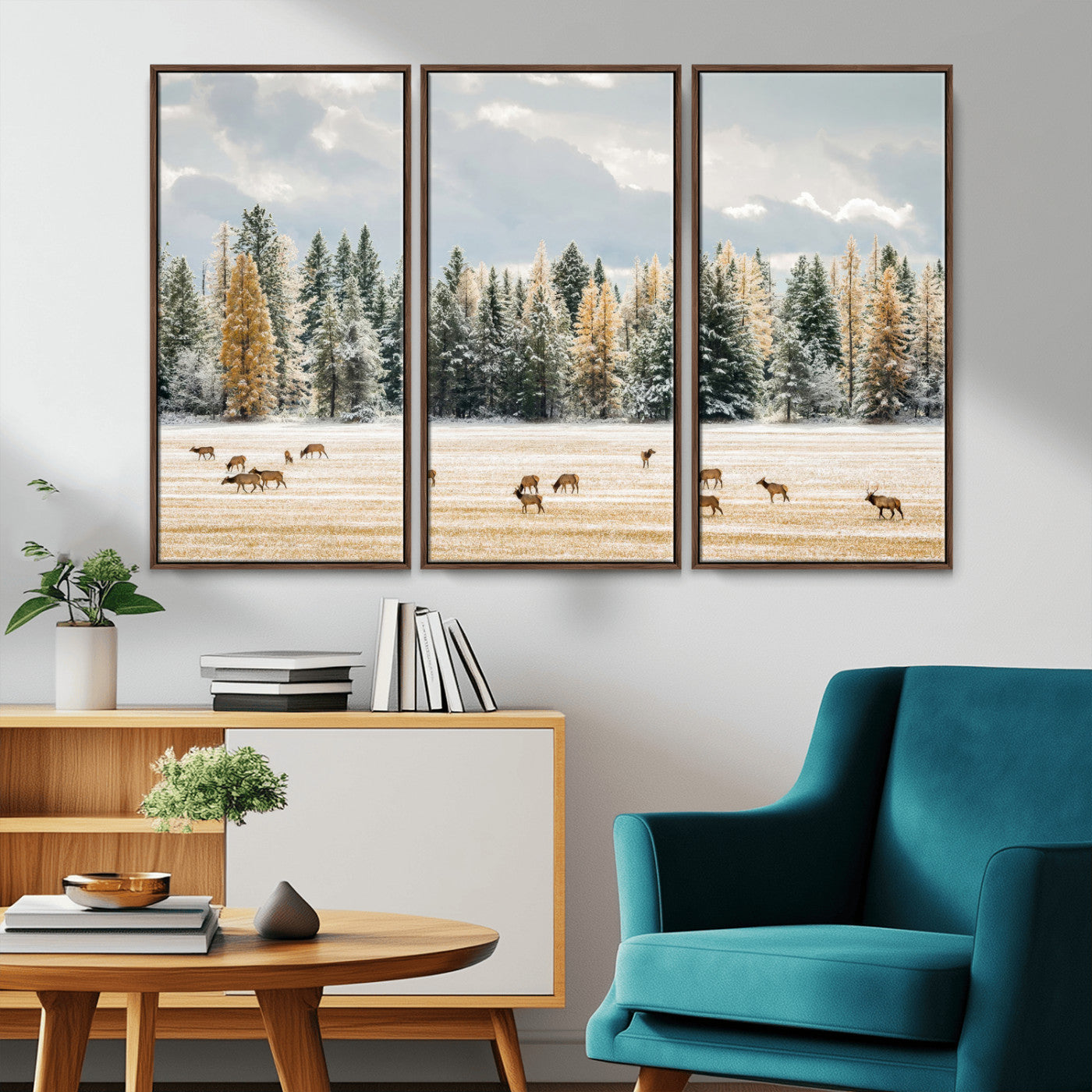 Elk herd in a snowy field with golden pine trees and frosted evergreens, ideal for neutral rustic or cabin-style home decor.