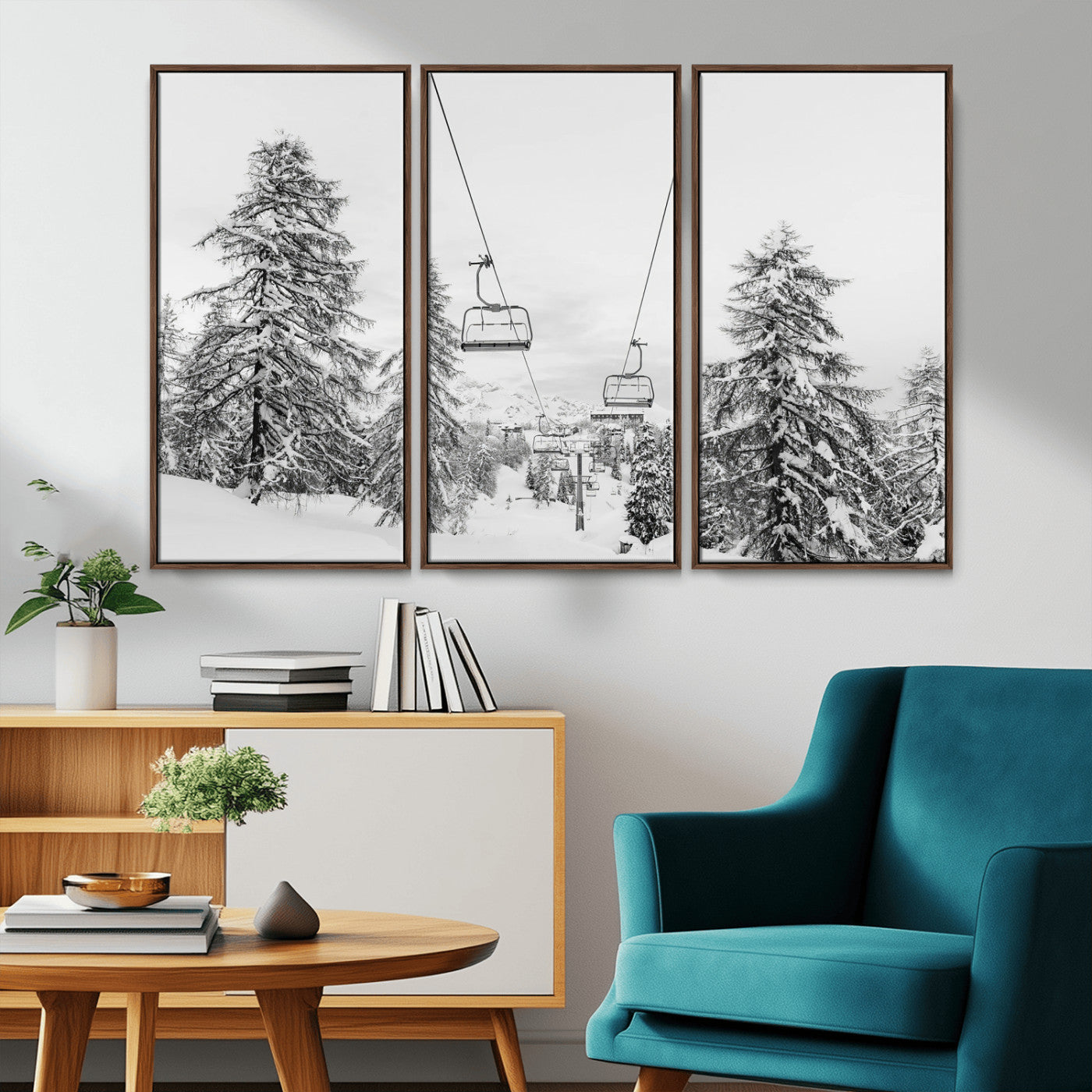 Black and white image of a ski lift amidst snow-covered pine trees, ideal for winter mountain or cabin-themed decor.
