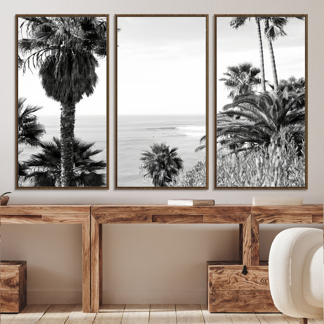 Monochrome canvas of palm trees framing a coastal surf scene, perfect for California-inspired or retro black-and-white beach decor.