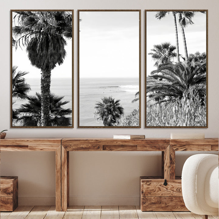 Monochrome canvas of palm trees framing a coastal surf scene, perfect for California-inspired or retro black-and-white beach decor.