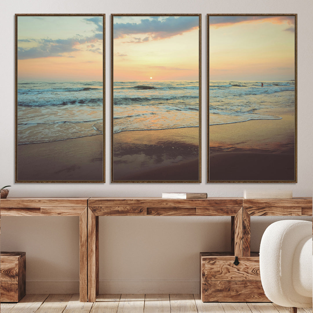 Warm sunset over gentle ocean waves with pastel sky and reflections on wet sand, creating a calm and soothing beach ambiance.