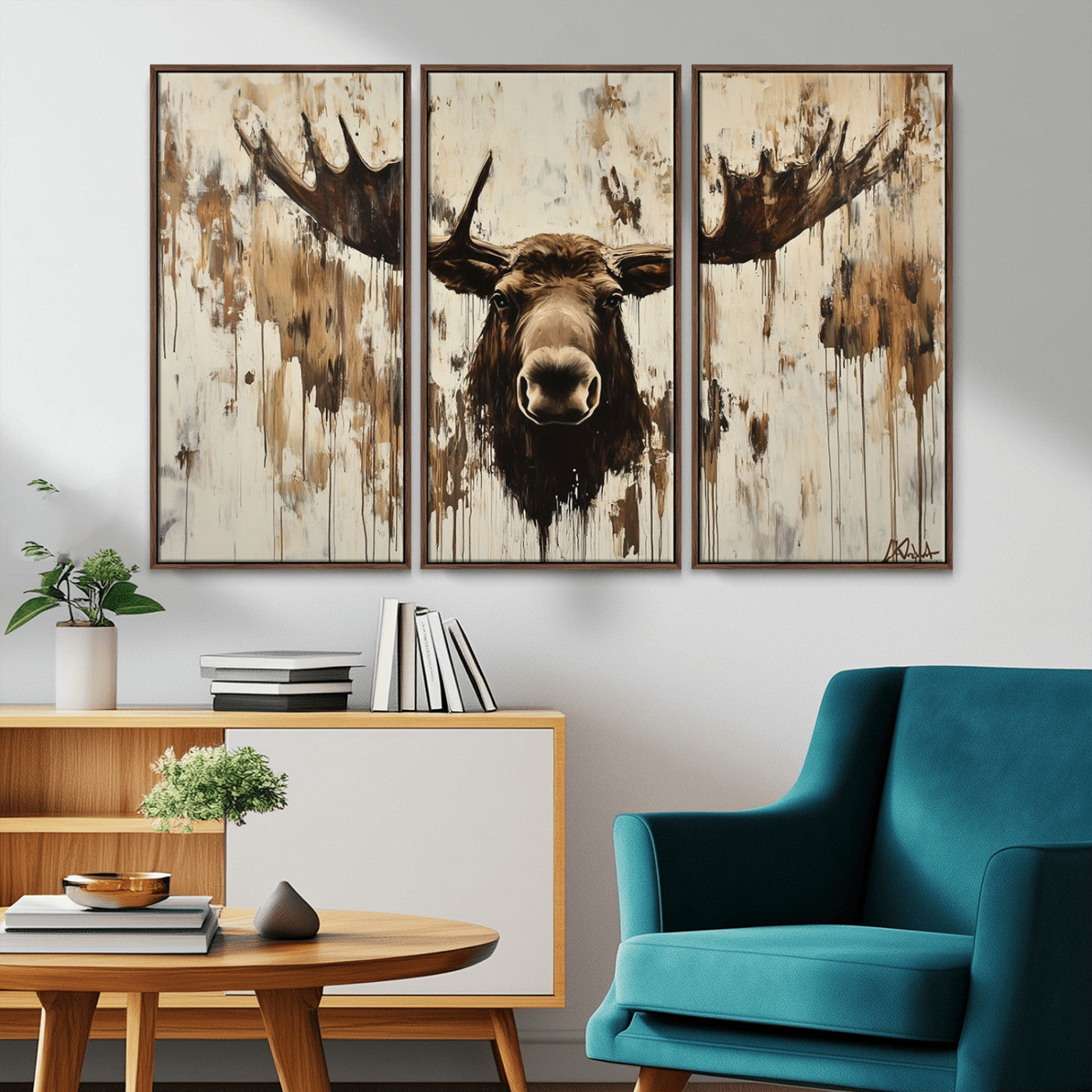 Expressive painting of a moose head with wide antlers in dark brown and beige tones, featuring paint drips and splatters on a light textured background, creating a striking rustic wall art canvas.