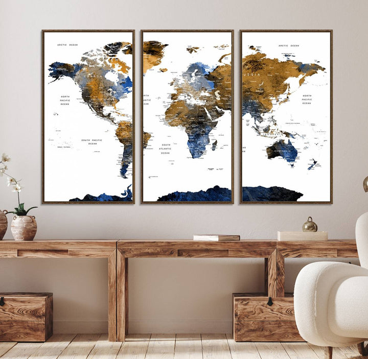 The Triptych Modern World Map Canvas in blue and brown is an ideal global decor piece for enhancing living rooms or offices. It comes ready to hang.