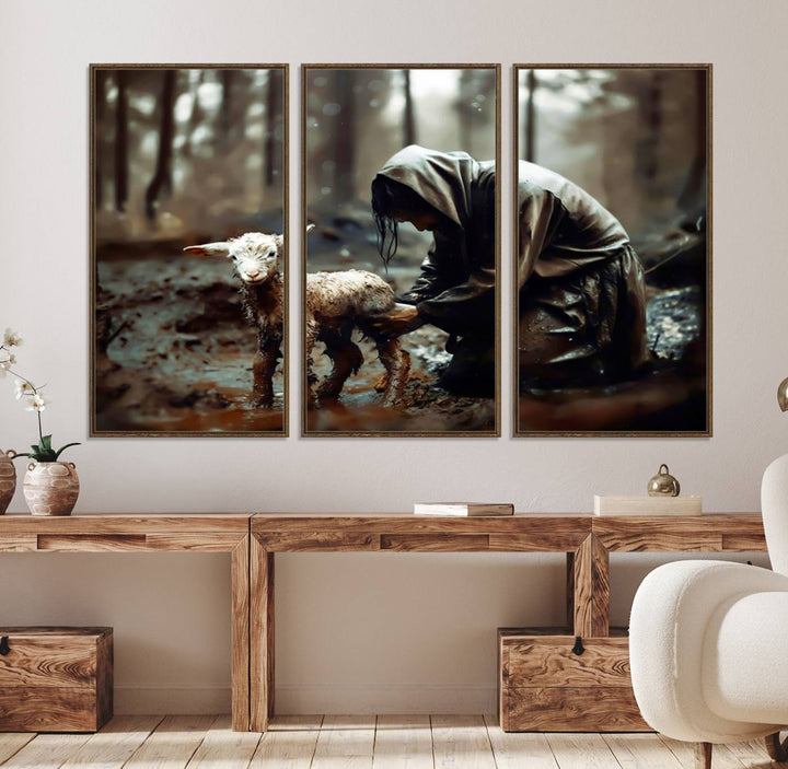 Jesus Lost Lamb Wall Art: A cloaked figure tends a lamb in a muddy forest.