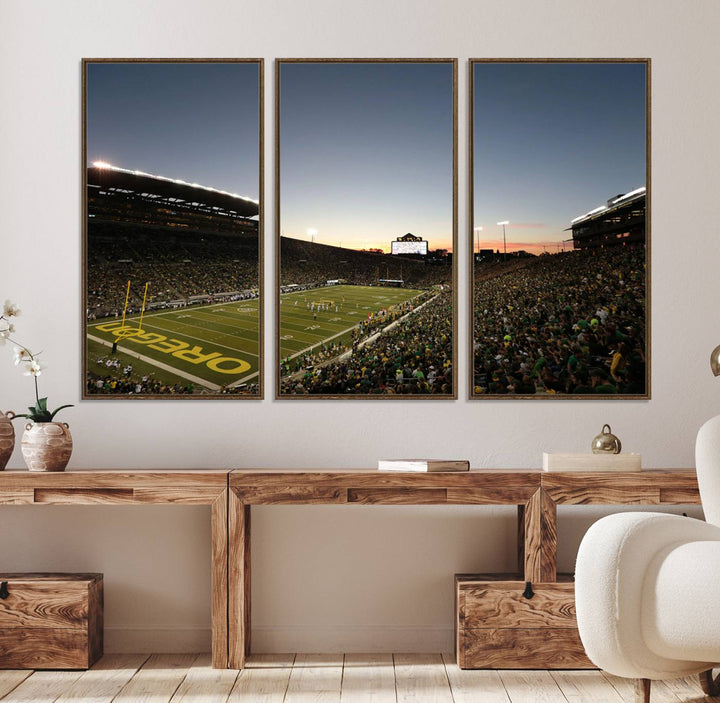 Canvas artwork depicting an Oregon Ducks football game at Autzen Stadium, capturing a sunset and packed stands.