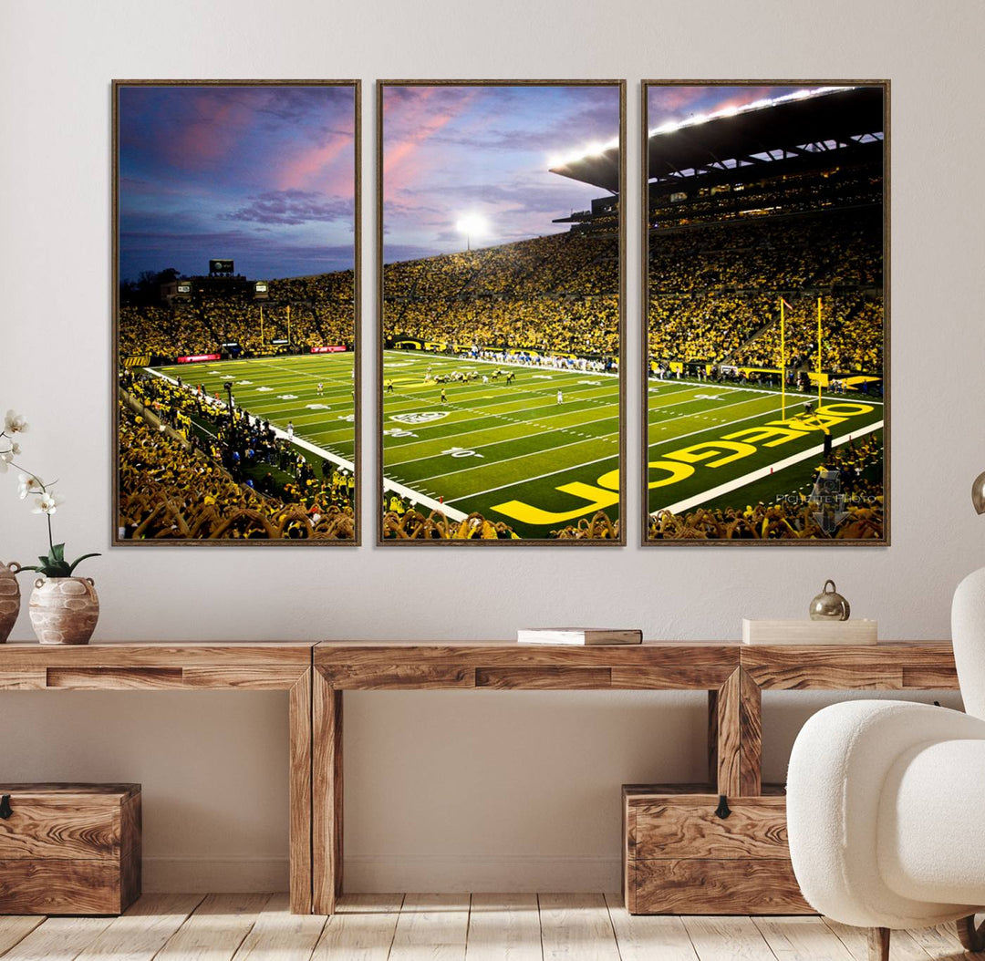 This gallery-quality canvas print features a depiction of the OREGON field filled with fans at sunset, capturing the essence of the University of Oregon Ducks Autzen Stadium.