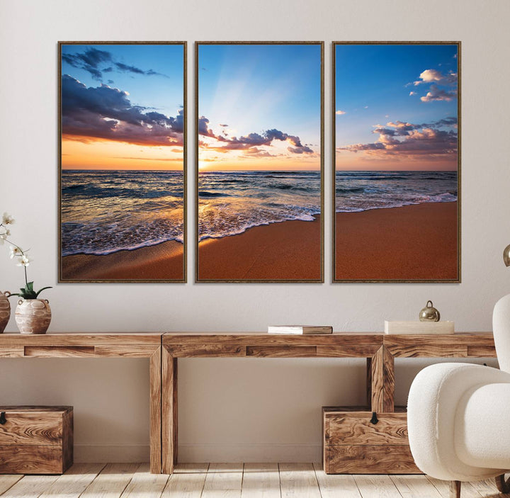 A Golden Hour Beach Sunset canvas hangs in the living room.