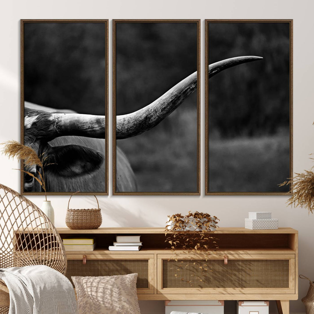 Cow Longhorn Wall Art: This black and white print adds rustic charm.