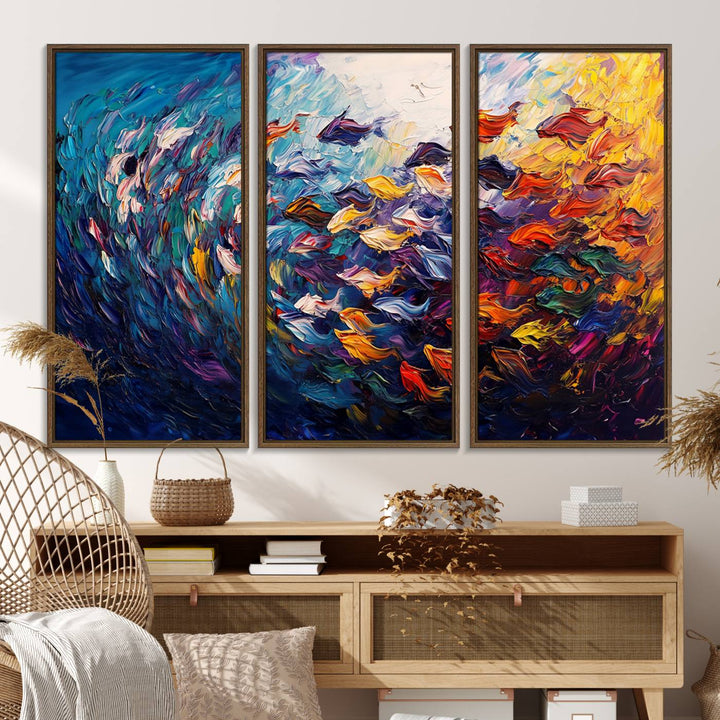 The Vibrant Abstract Fish Swarm Art features a colorful 3-piece canvas that adds a pop of color.