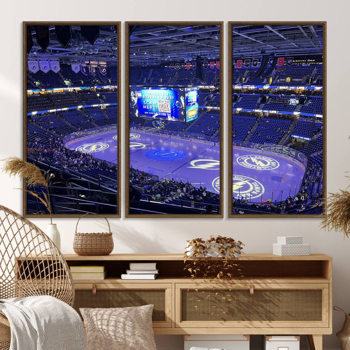 The wall art canvas print at Amalie Arena features team logos on ice, encapsulating the vibrant atmosphere of an NHL hockey stadium.