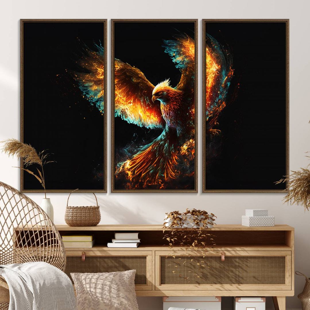 The Fiery Phoenix Canvas Print, showcasing a majestic bird with fiery wings against a black background, makes for the perfect bold decor in your living room.