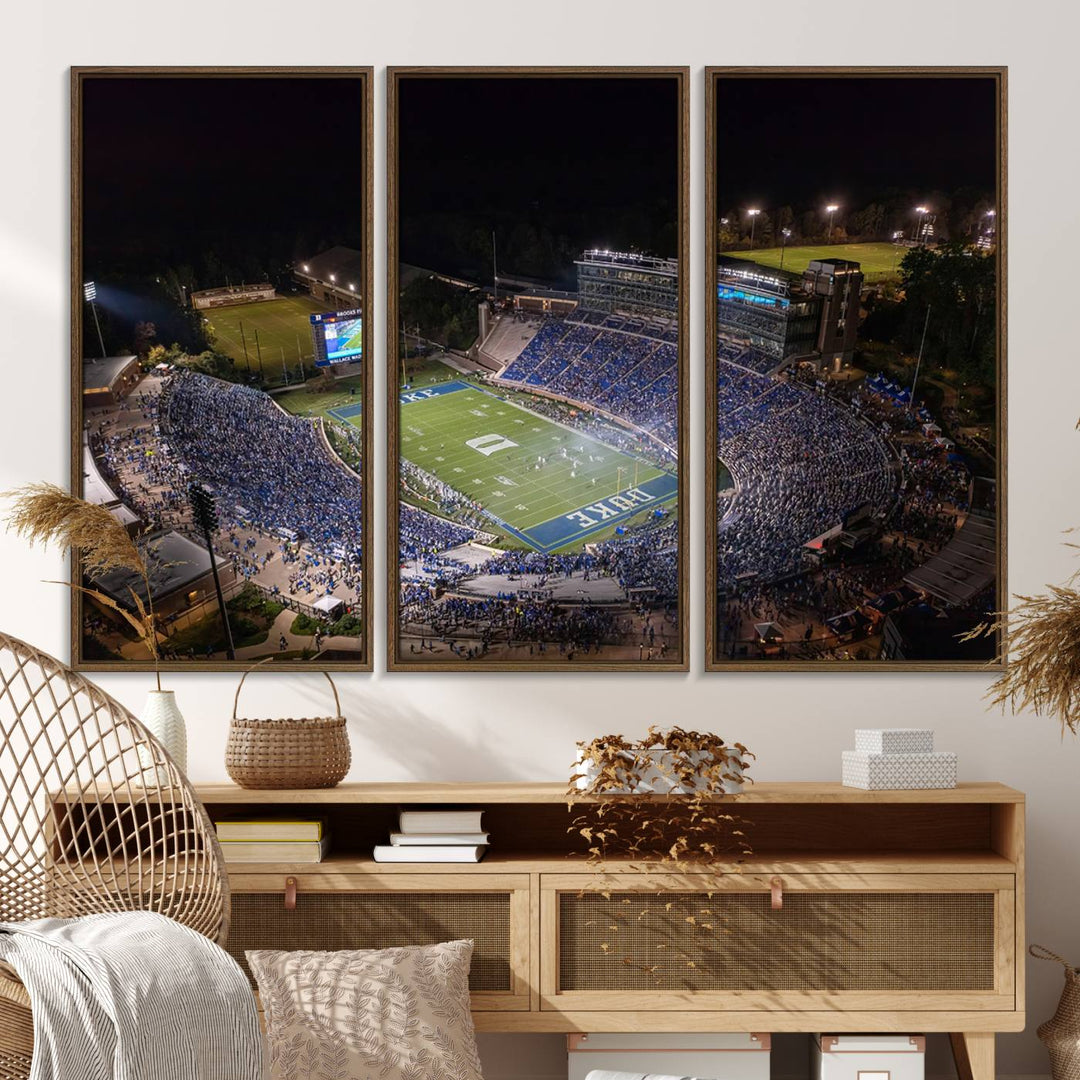 Night aerial view of packed Duke Blue Devils Wallace Wade Stadium, surrounded by trees and illuminated by lights; perfect for high-resolution prints.