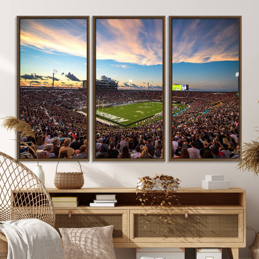 A vibrant wall art canvas captures a sunset scene at Orlandos FBC Mortgage Stadium, featuring the UCF Knights.