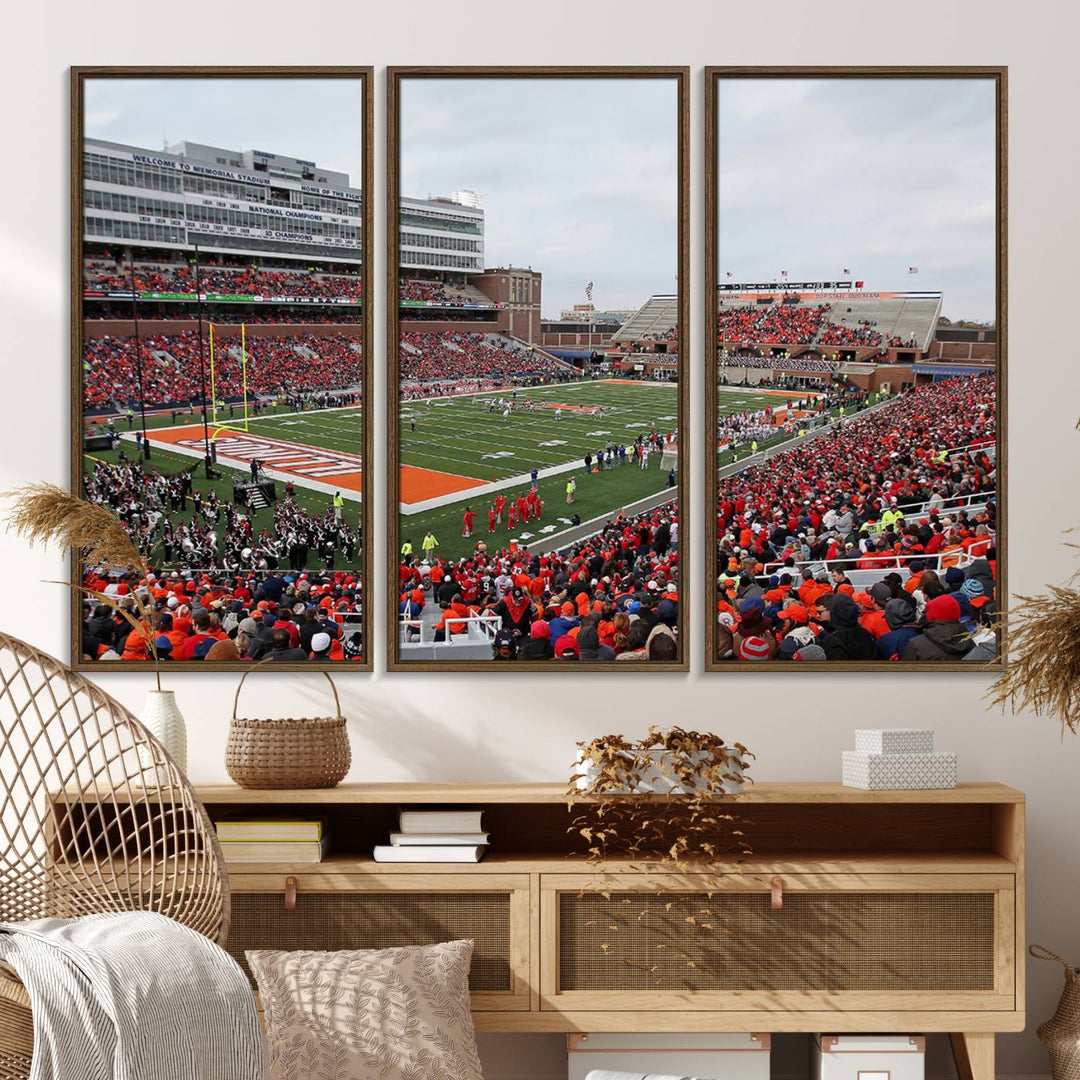 A University of Illinois Fighting Illini wall art canvas hangs on the wall, depicting a packed stadium.