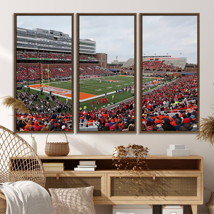 A University of Illinois Fighting Illini wall art canvas hangs on the wall, depicting a packed stadium.