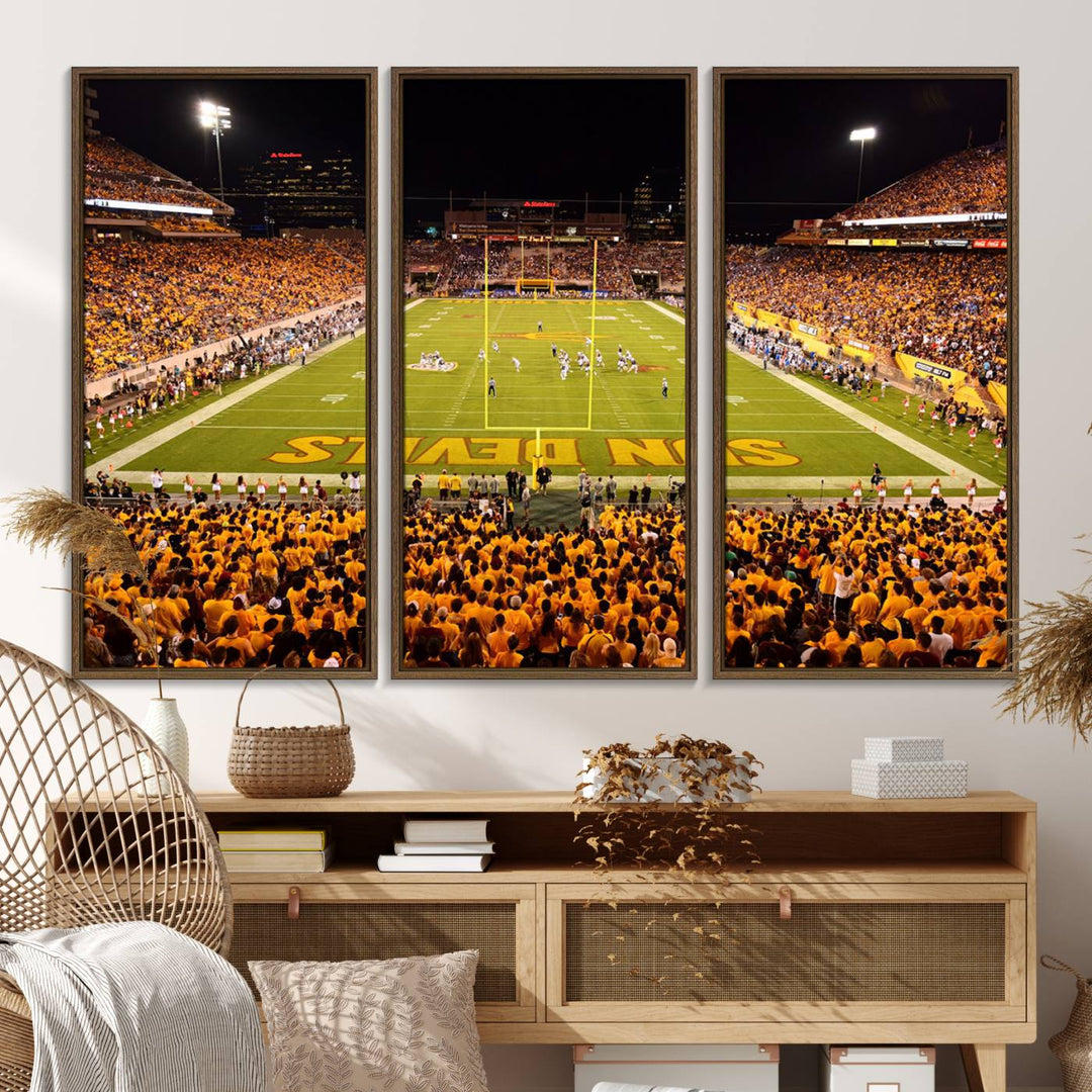 The Phoenix Stadium Canvas Wall Art features a vibrant depiction of a packed stadium filled with ASU Sun Devils fans wearing yellow shirts.